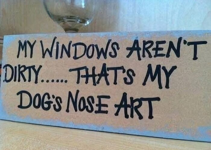 Funny dog nose art window sign with rustic home decor for pet lovers.