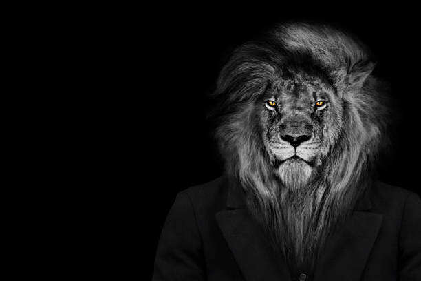 Lion-headed man in a black suit representing power, leadership, and animal-human duality.