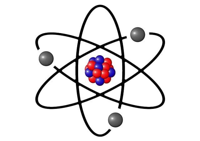Illustration of an atomic structure showing nucleus, protons, neutrons, and electron cloud for science education.